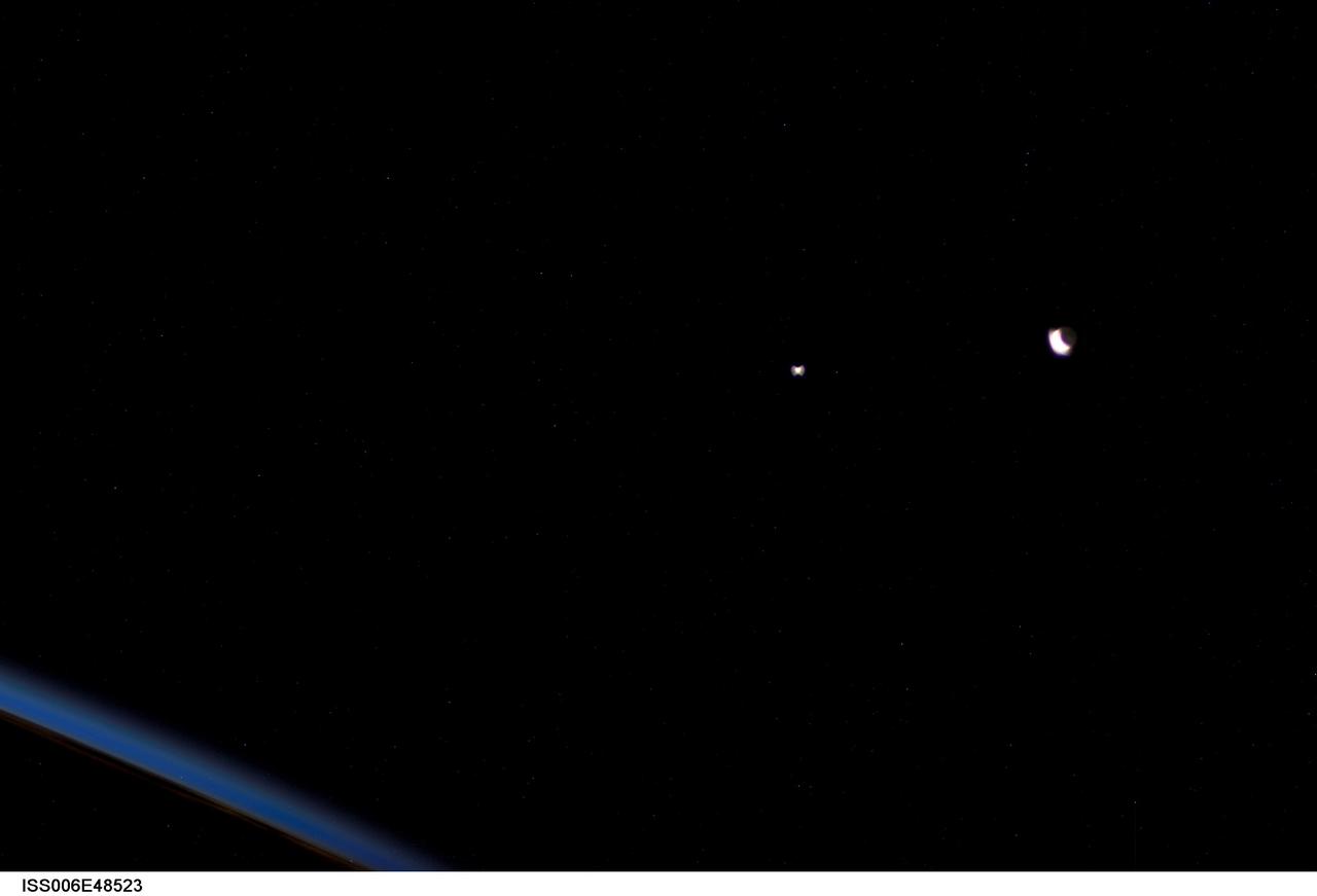 Venus and crescent Moon from ISS